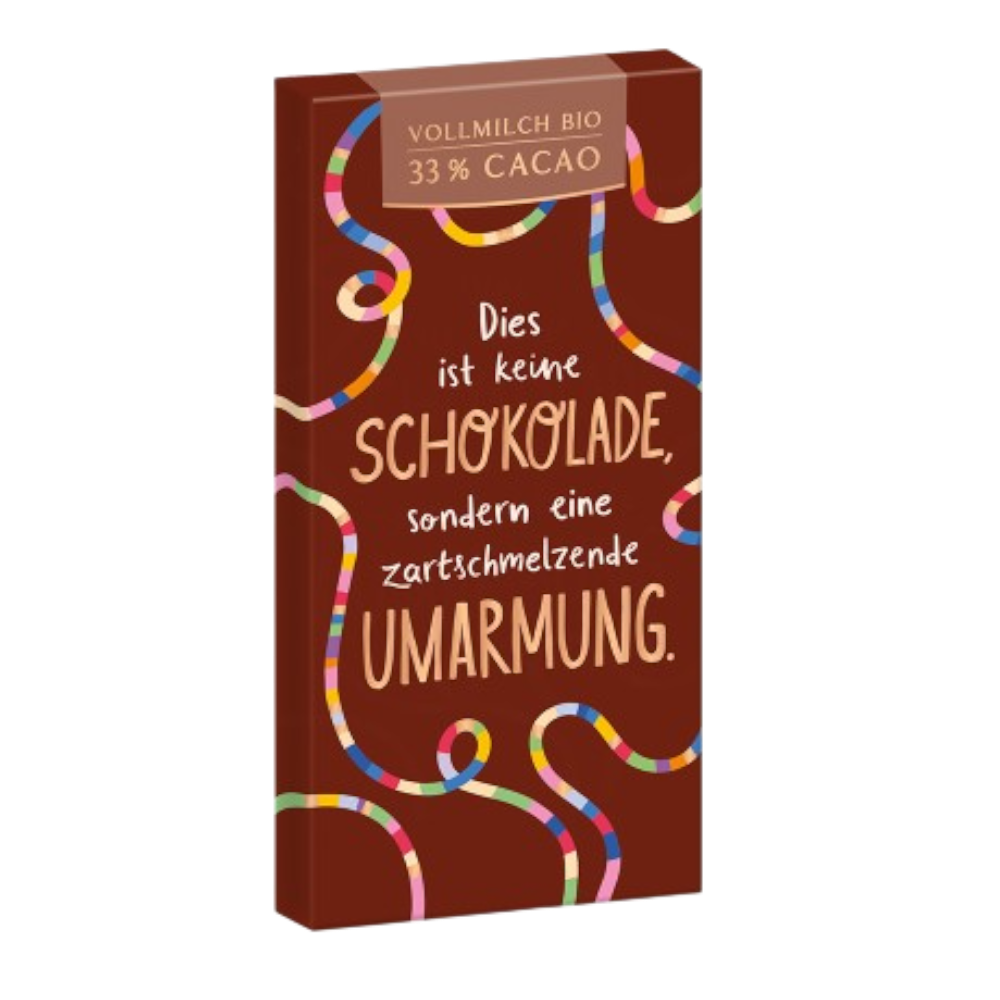 Grafik Werkstatt Bio-Schokolade 80g mit Aufschrift "Dies ist keine Schokolade, sondern eine zartschmelzende Umarmung"