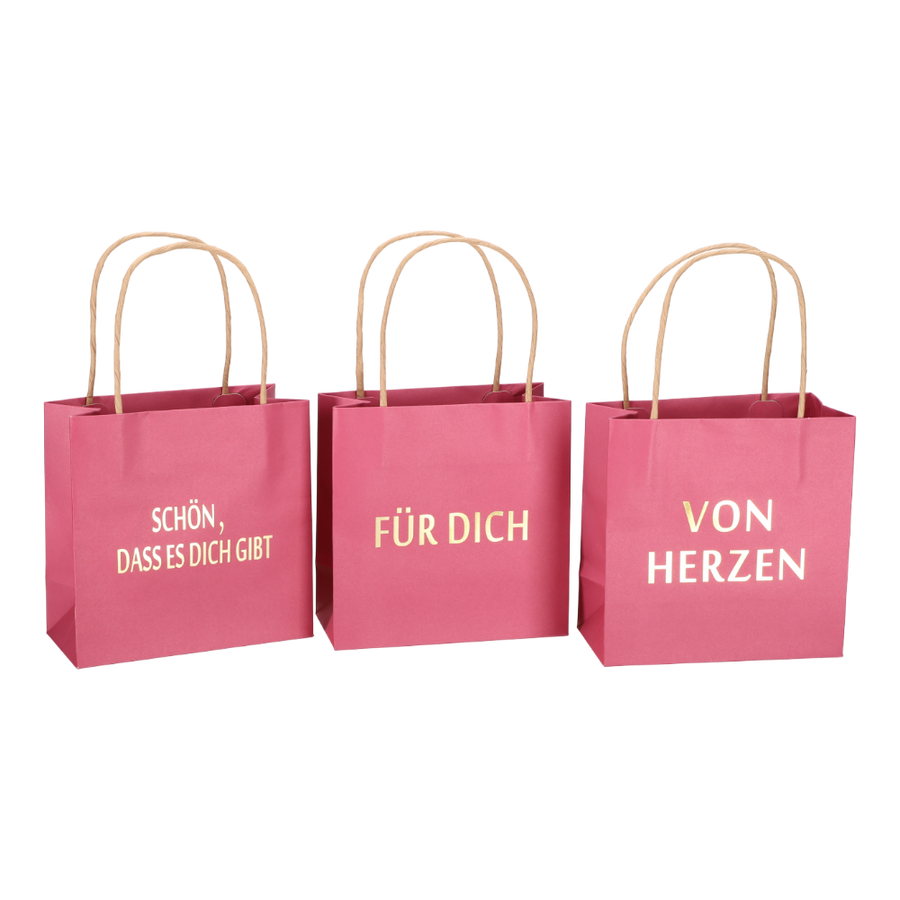 Geschenktüte bedruckt 3 Sprüche pink in fröhlichem Design, 16x8x16 cm, mit goldenen Sprüchen "Für Dich", "Schön, dass es Dich gibt", "Von Herzen".