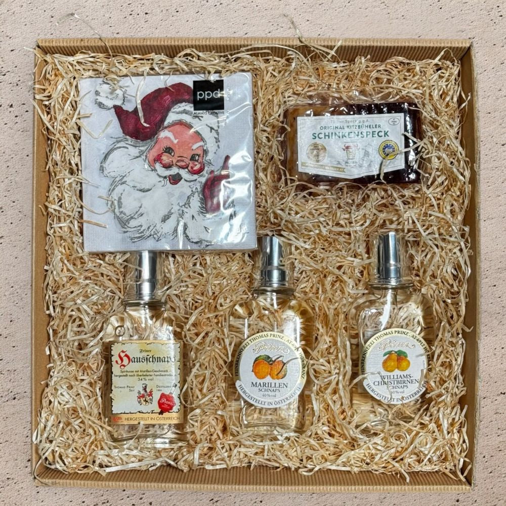 Schnaps Geschenkbox mit Prinz Hausschnaps Marille Marillen Schnaps Williams Birnen Schnaps Schinkenspeck und Jolly St Nick Servietten in Geschenkverpackung