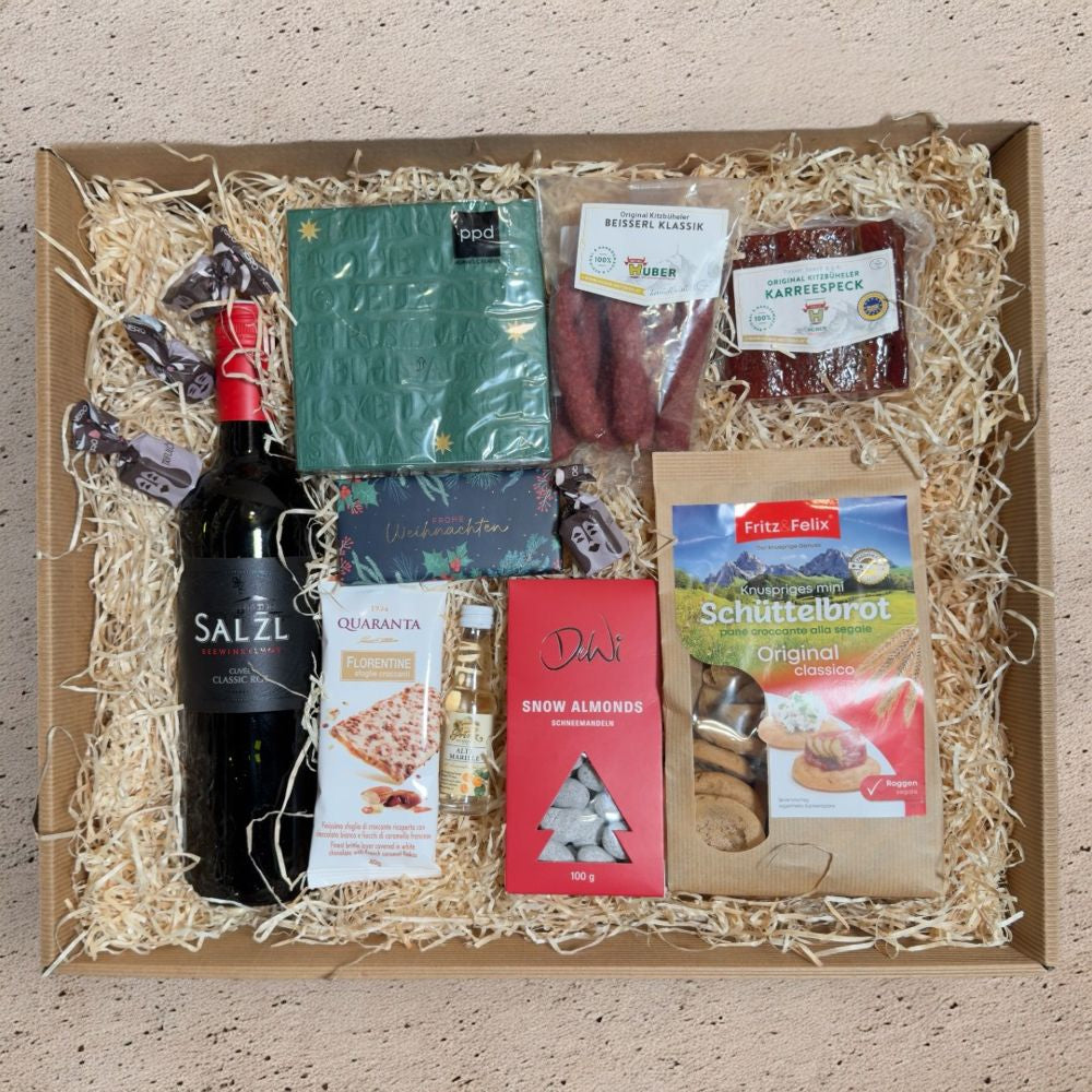 Wein Geschenkbox Österreich mit Salzl Cuvée Classic Rot Karreespeck Hubers Beisserl Prinz Alte Marille Schüttelbrot Schneemandeln und Tartufo in Geschenkverpackung