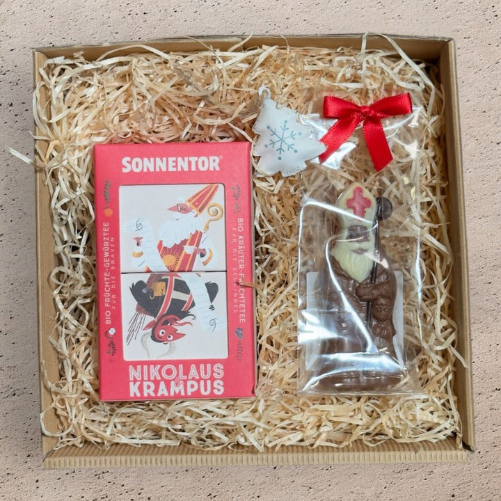 Nikolaus Geschenkbox mit Sonnentor Nikolaus Krampus Tee Mini Bischof Schokolade und Metall Anhängern Stern Herz Baum in Geschenkverpackung